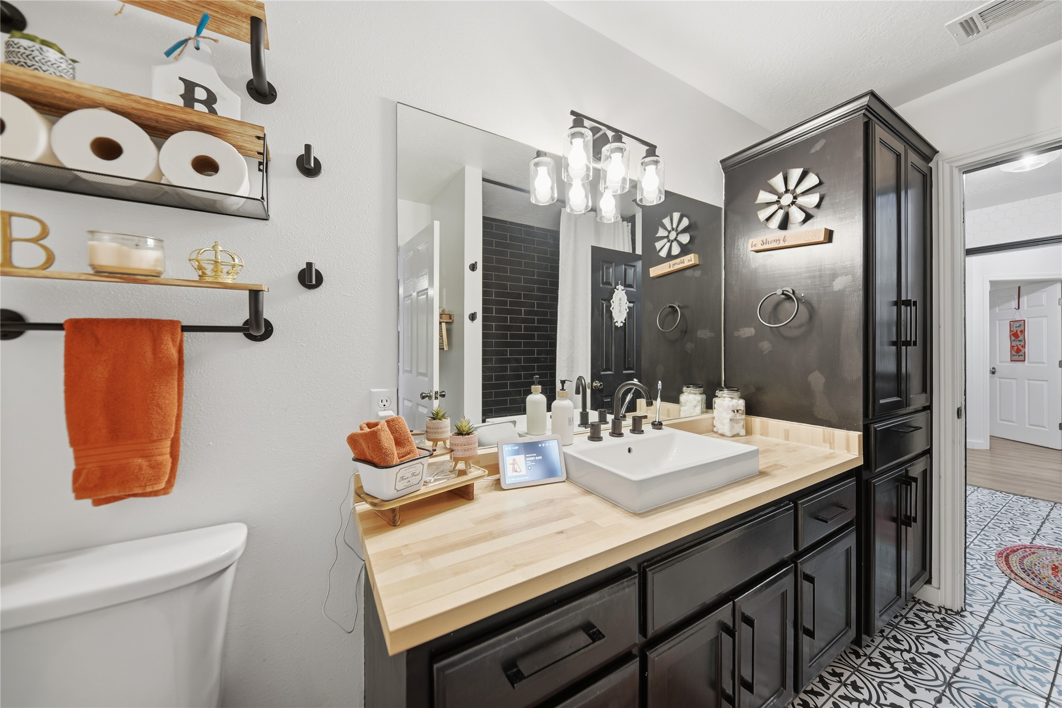 540 Hickory Creek Road Bellville, TX 77418 - Photo 18 of 49 a bathroom with a sink mirror and vanity