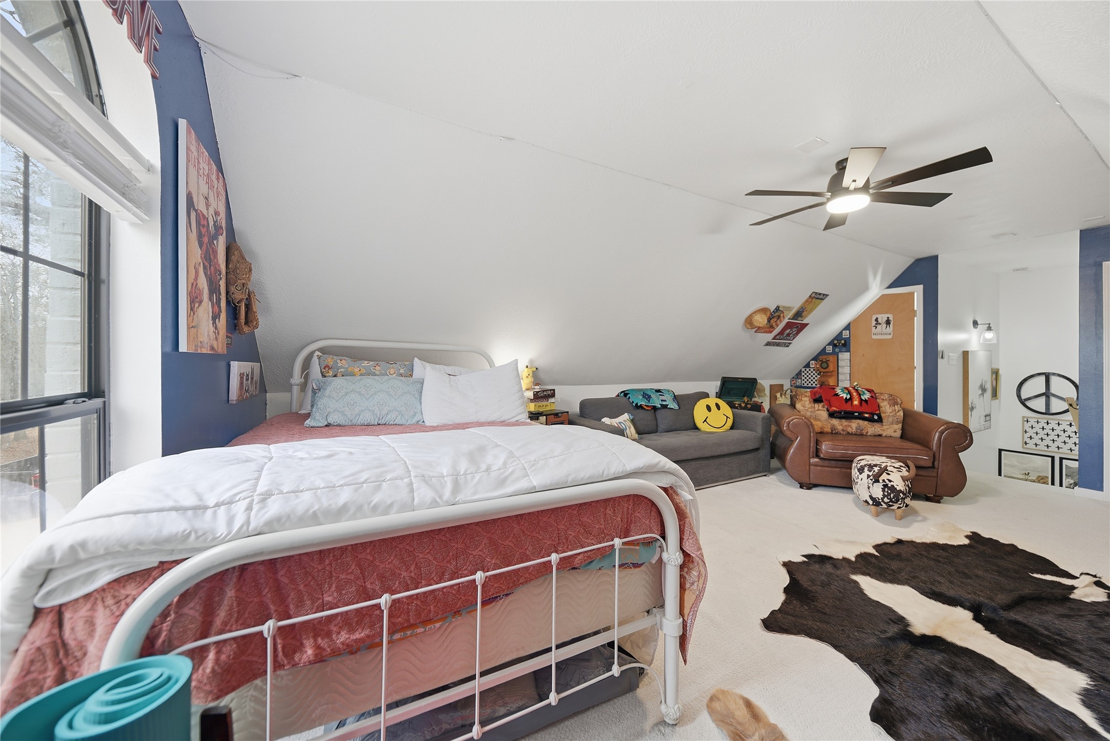 540 Hickory Creek Road Bellville, TX 77418 - Photo 25 of 49 a bedroom with a bed and ceiling fan