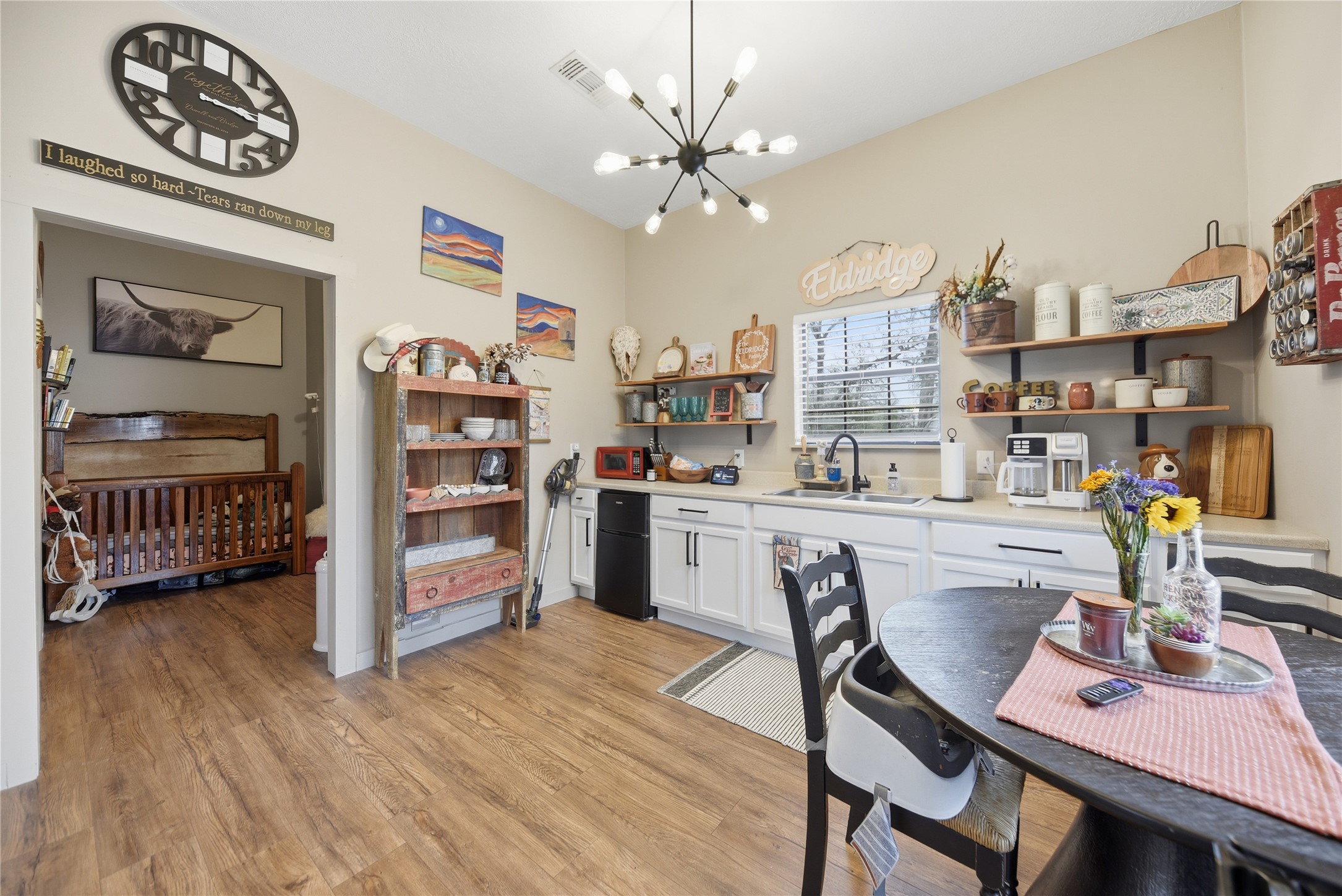 540 Hickory Creek Road Bellville, TX 77418 - Photo 42 of 49 a dining room with furniture and a kitchen view