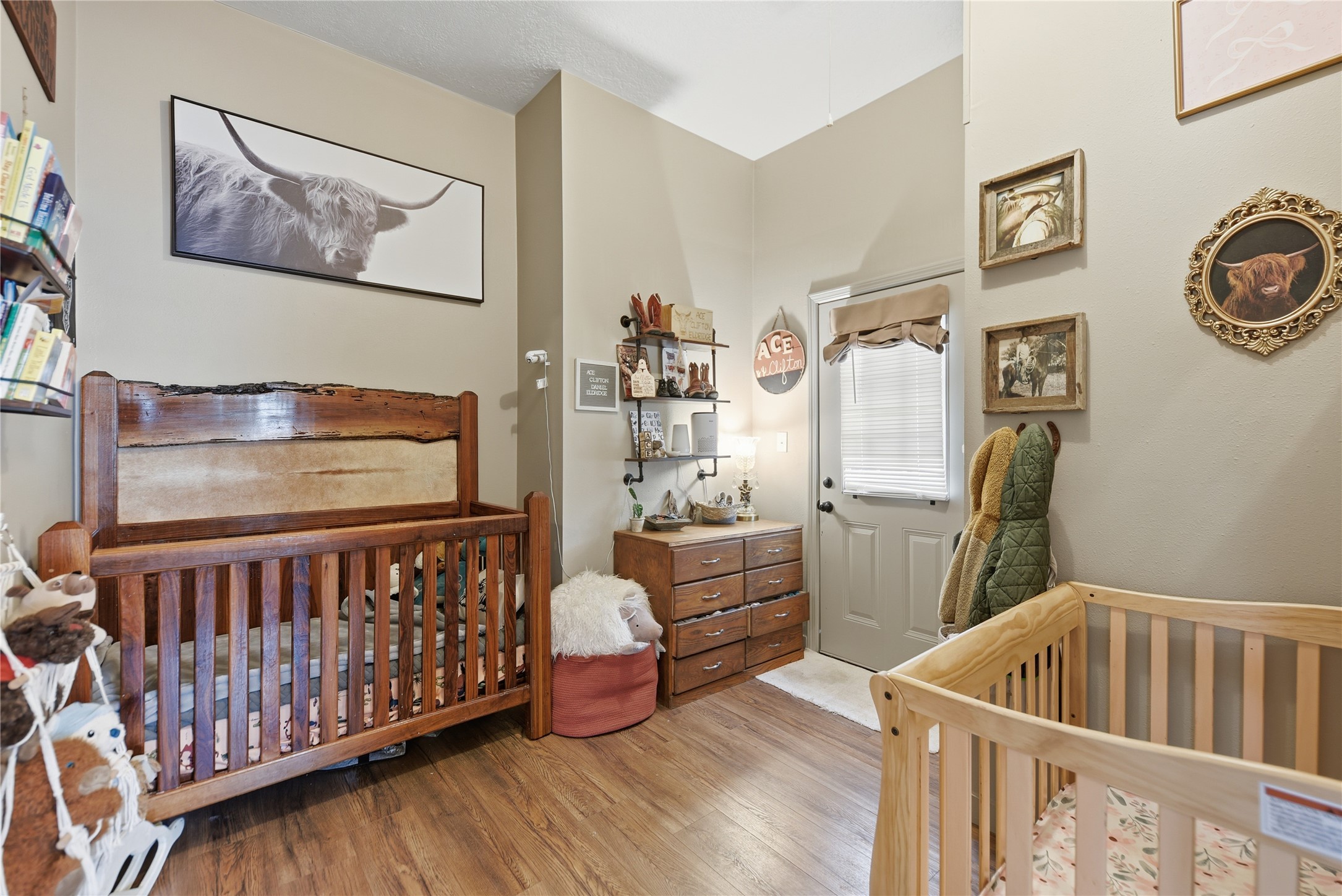 540 Hickory Creek Road Bellville, TX 77418 - Photo 46 of 49 a bedroom with furniture and wooden floor