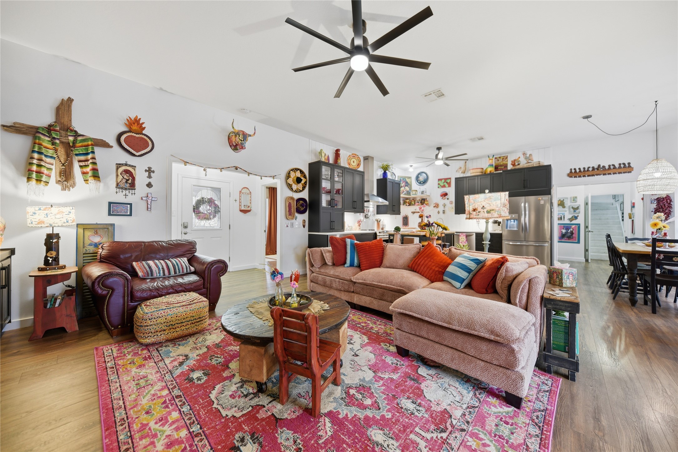 540 Hickory Creek Road Bellville, TX 77418 - Photo 9 of 49 a living room with furniture and a view of kitchen