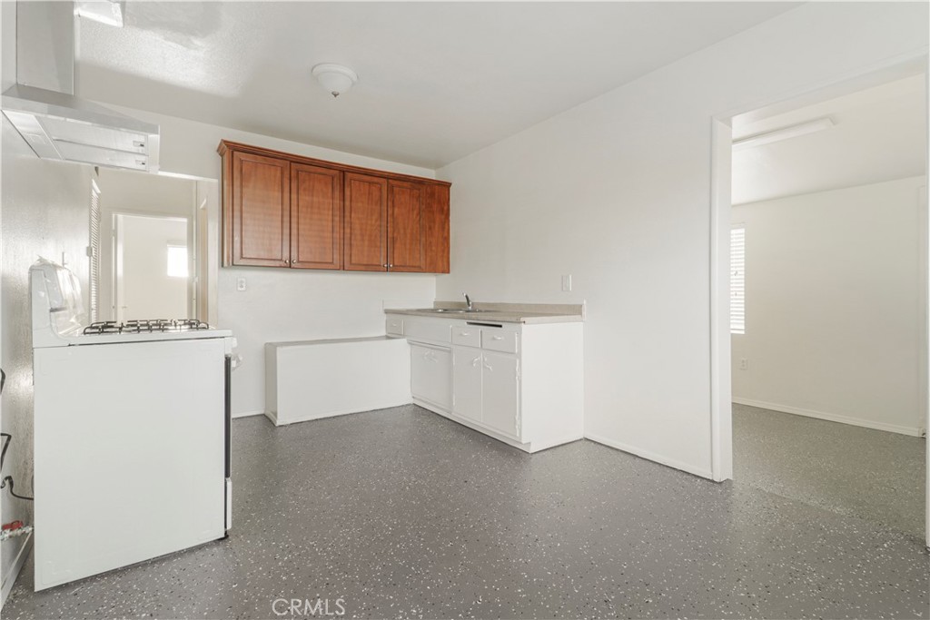 437 North Franklin Street Hemet, CA 92543 - Photo 4 of 25 a view of a kitchen with a sink