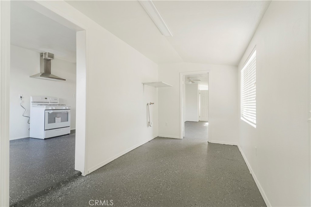 437 North Franklin Street Hemet, CA 92543 - Photo 6 of 25 a view of a big room with windows and cabinet