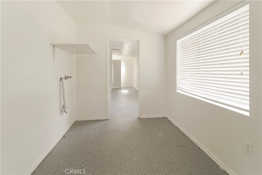 437 North Franklin Street Hemet, CA 92543 - Photo 8 of 25 a view of an empty room with a window