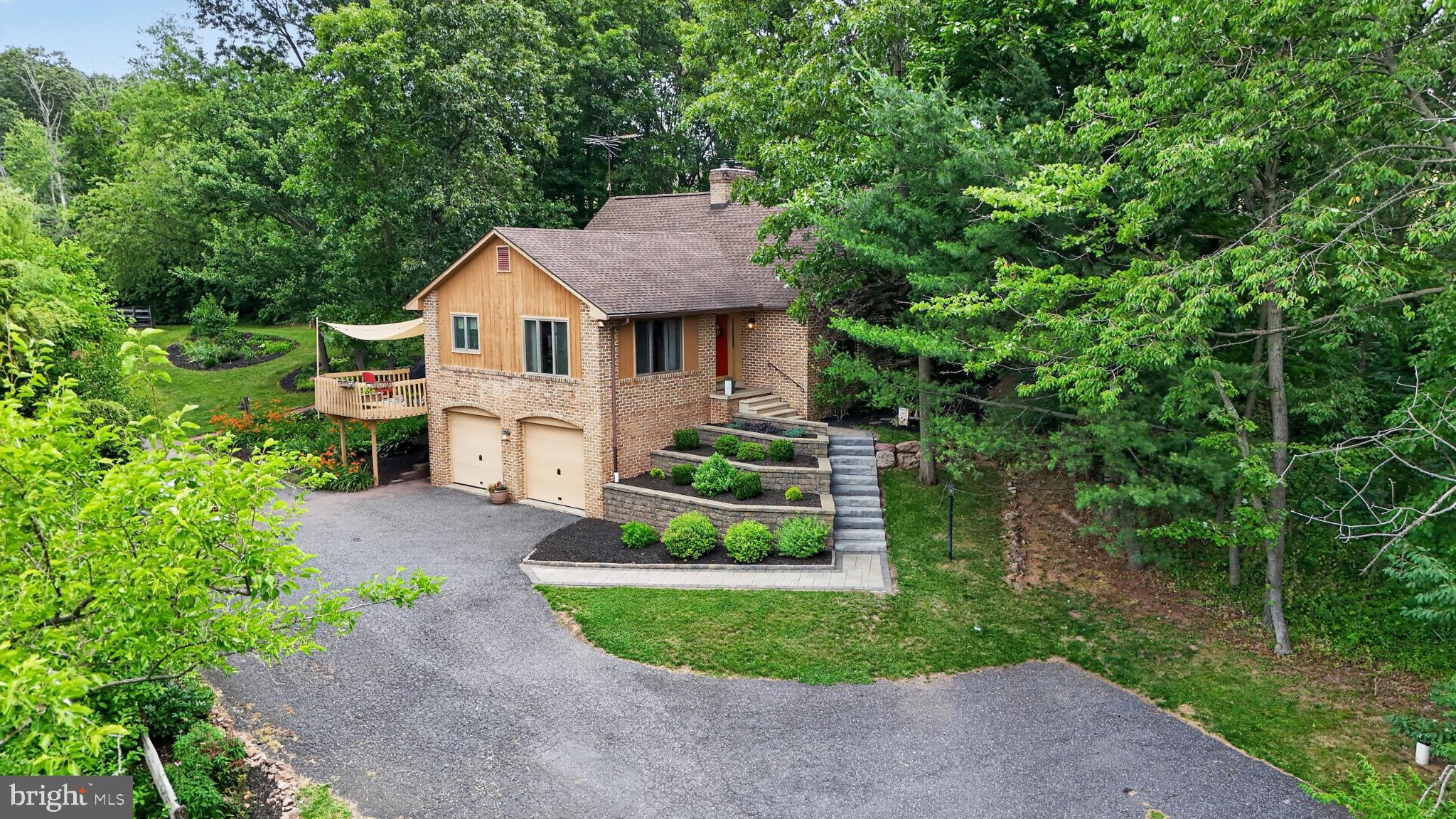 2571 Valley View Road Morgantown, PA 19543 - Photo 8 of 75 Charming home nestled in lush greenery.