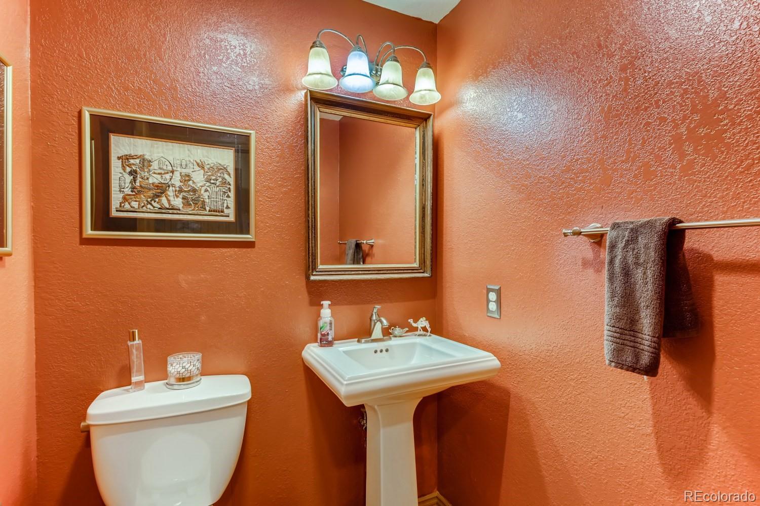 869 Hill And Dale Road, Unit D Golden, CO 80401 - Photo 13 of 27 a bathroom with a sink and a mirror