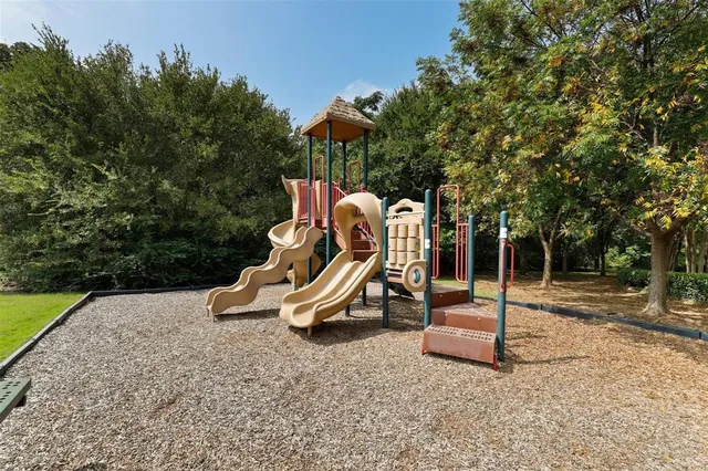 a park view with a slide