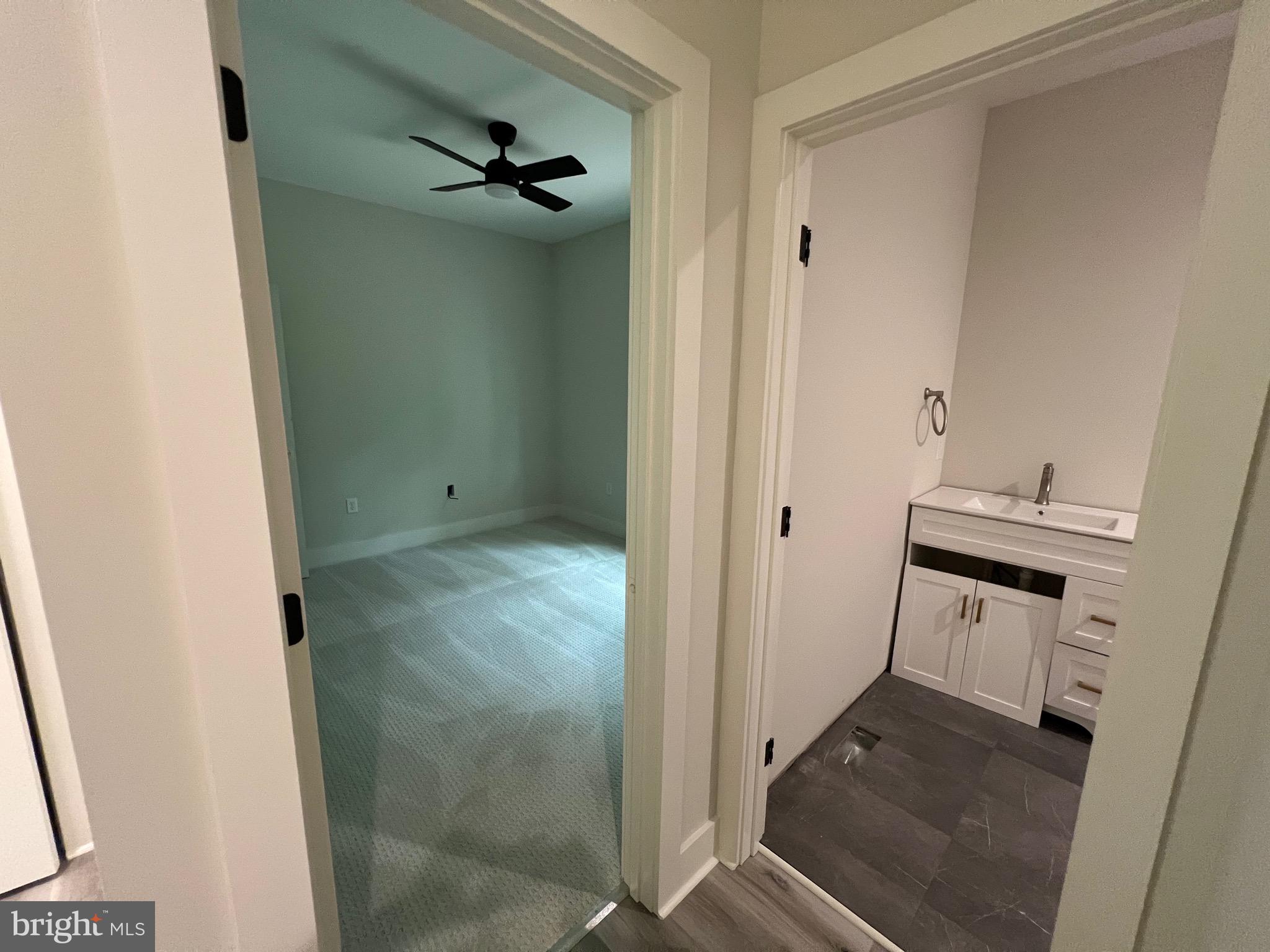 175 Rose Way Colonial Beach, VA 22443 - Photo 24 of 33 a bathroom with a sink a toilet and shower
