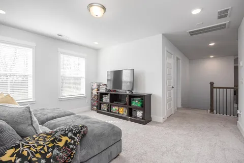 a bedroom with a bed and closet