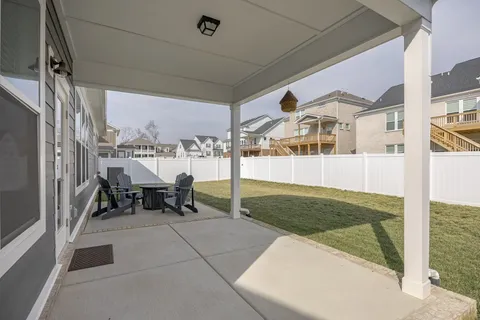 a house with swimming pool in front of it