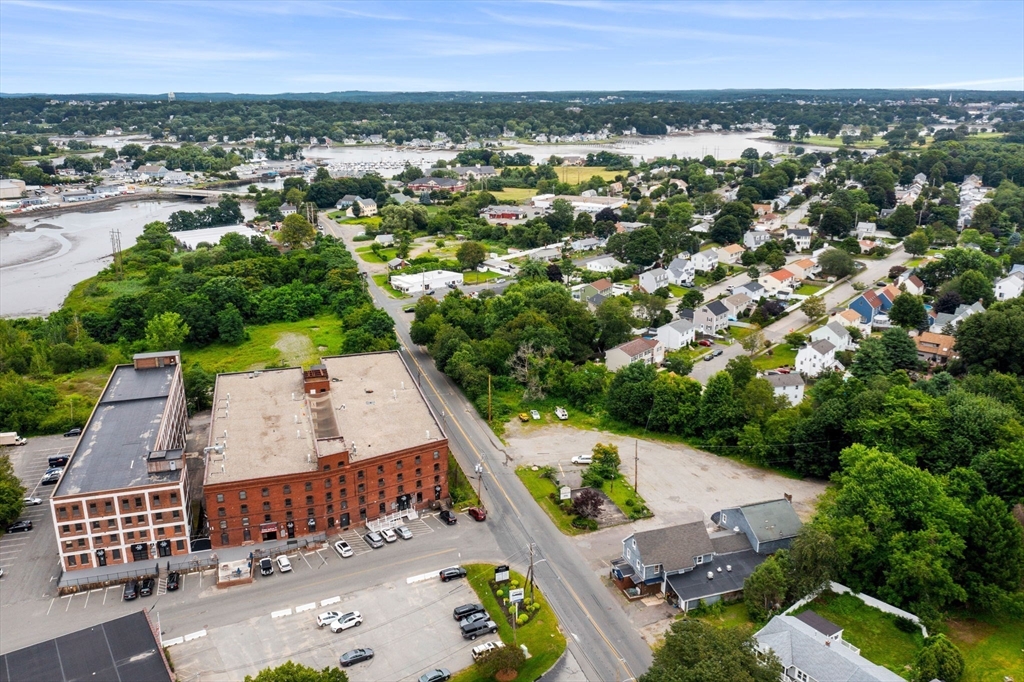 55 Pulaski Street Peabody, MA 01960 - Photo 11 of 21 an aerial view of a house with a yard