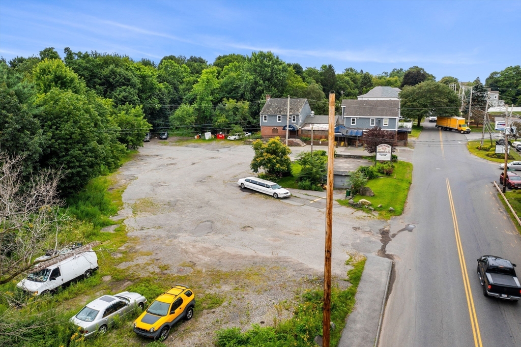 55 Pulaski Street Peabody, MA 01960 - Photo 12 of 21 a backyard of a house with lots of green space