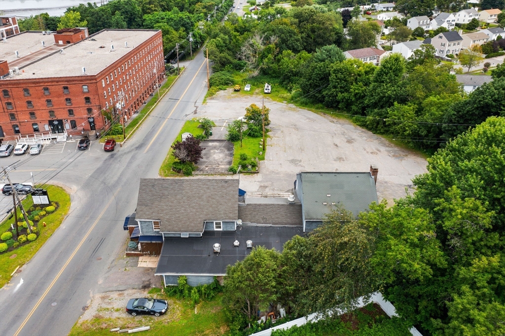 55 Pulaski Street Peabody, MA 01960 - Photo 8 of 21 an aerial view of residential houses with outdoor space