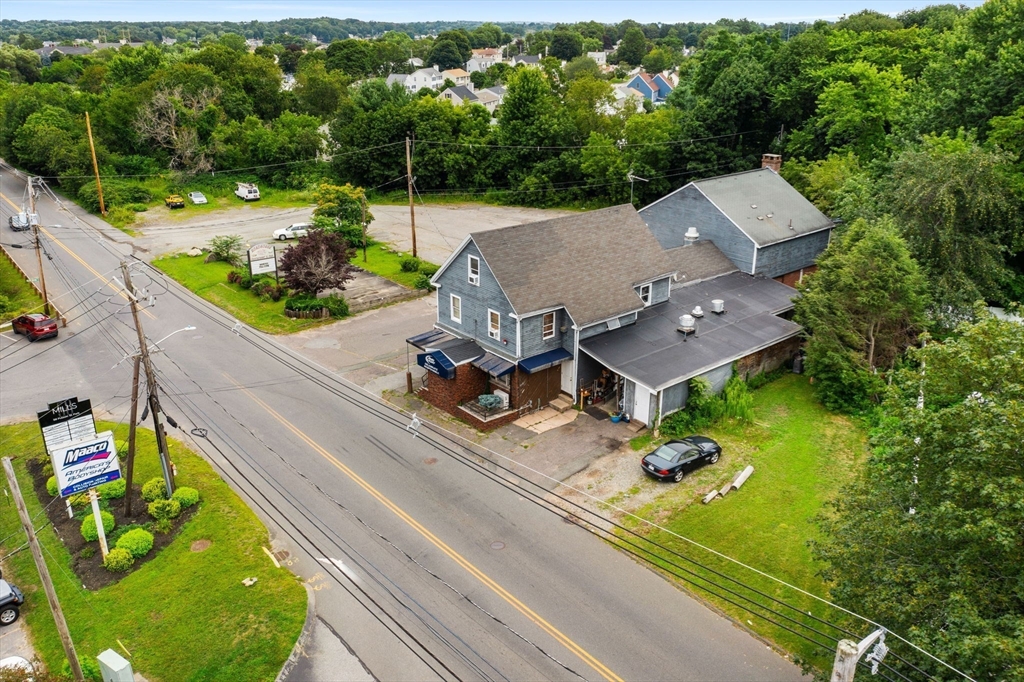55 Pulaski Street Peabody, MA 01960 - Photo 10 of 21 an aerial view of a house with a garden and swimming pool