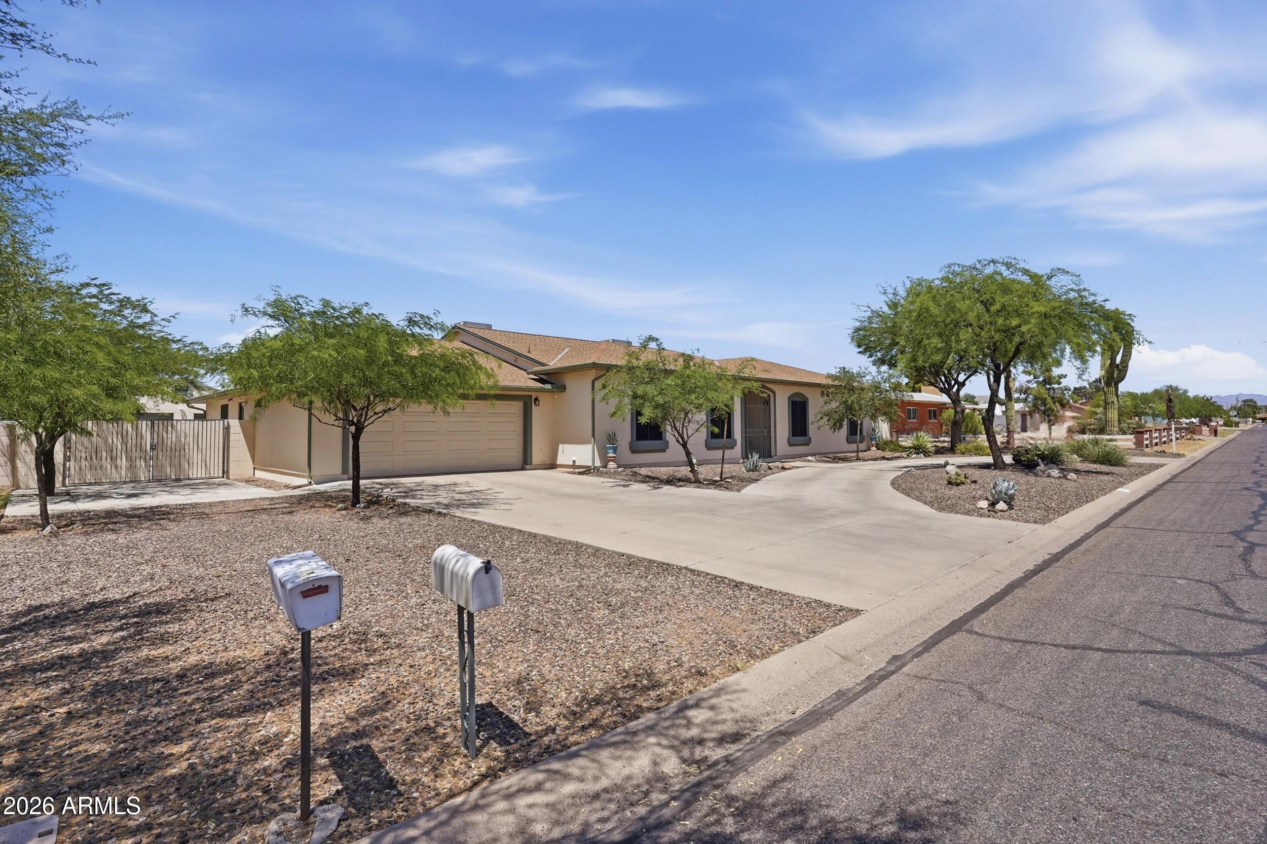 6334 East Albany Street Mesa, AZ 85205 - Photo 5 of 72 a view of a swimming pool with a patio