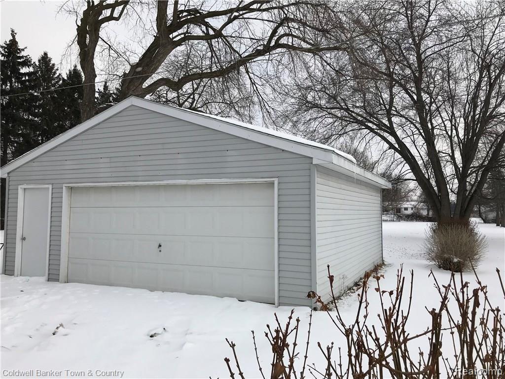 4403 Van Slyke Road Flint, MI 48507 - Photo 4 of 18 OVERSIZED TWO + CAR GARAGE