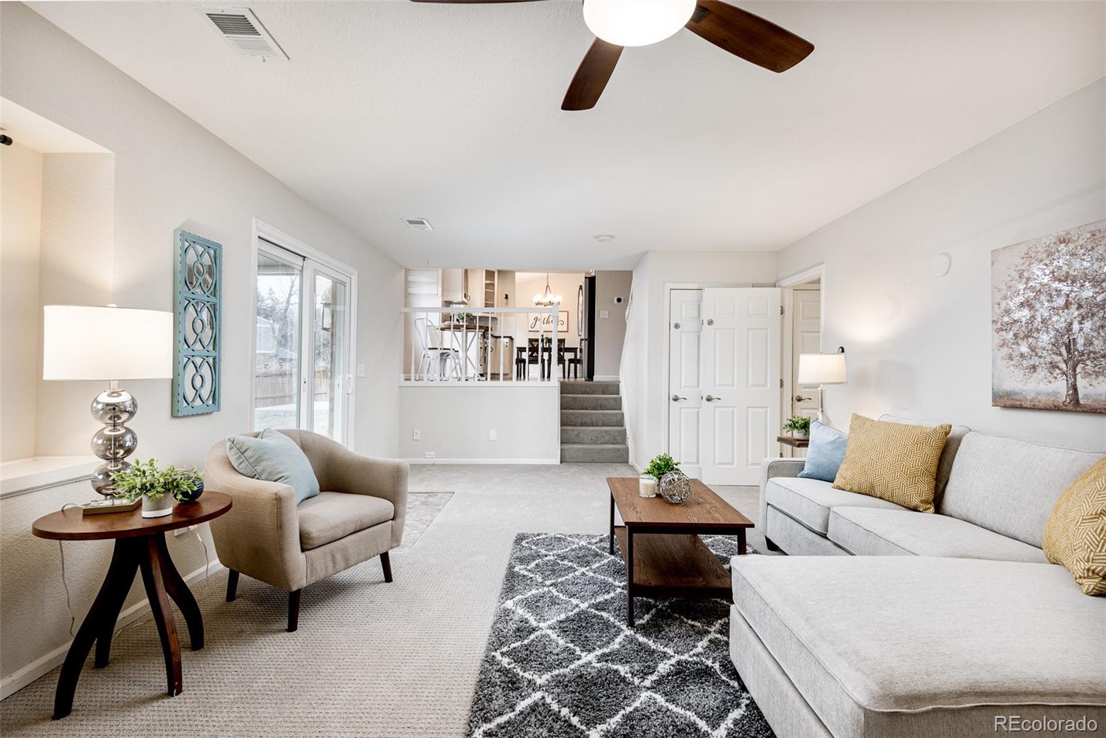 13492 Jackson Drive Thornton, CO 80241 - Photo 19 of 25 a living room with furniture