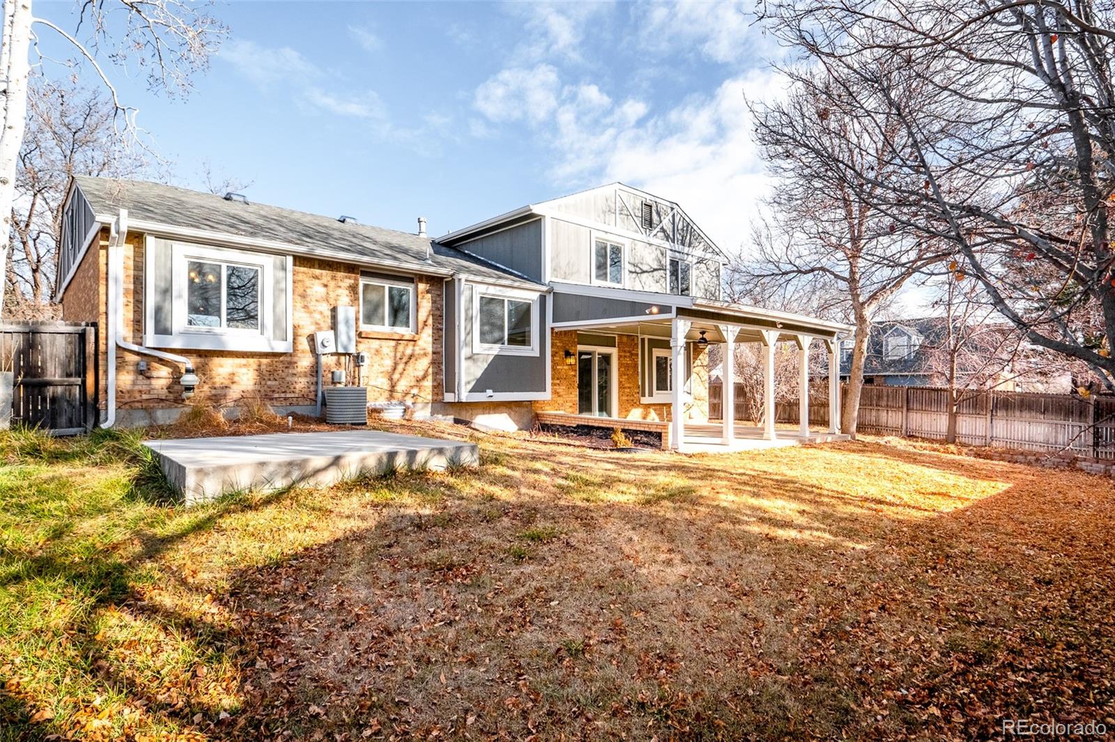13492 Jackson Drive Thornton, CO 80241 - Photo 24 of 25 a view of a house with a yard and snow