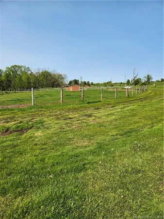 a view of a golf course with a lake