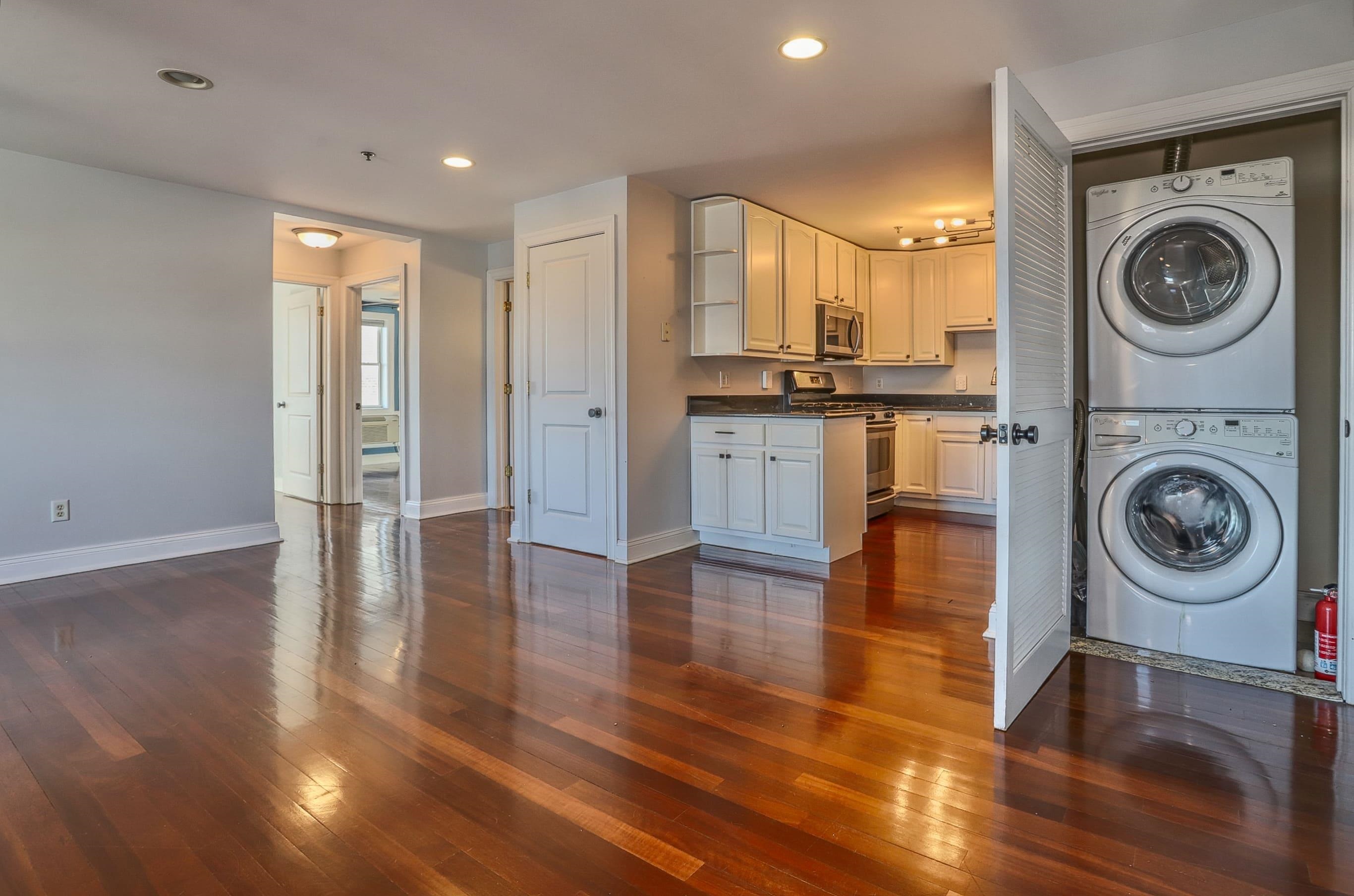 1720 New York Avenue, Unit 406 Union City, NJ 07087 - Photo 13 of 21 a view of a kitchen with washer and dryer