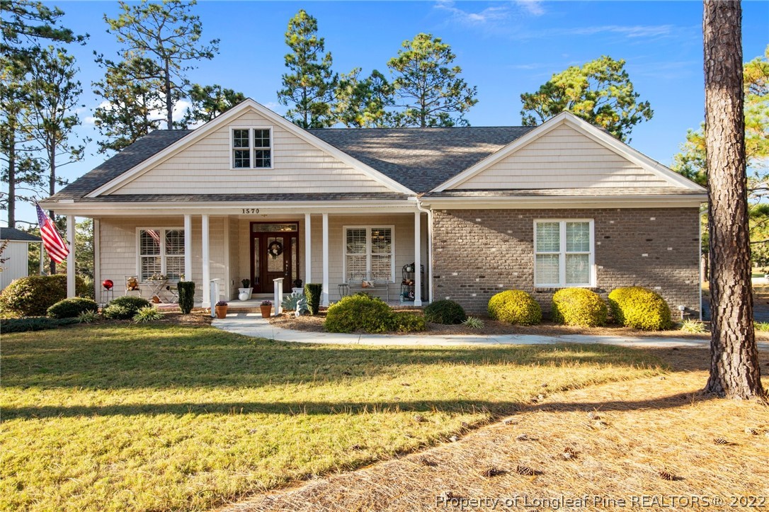 1570 Valley View Road Southern Pines, NC 28387 - Photo 1 of 44 a view of outdoor space yard and swimming pool