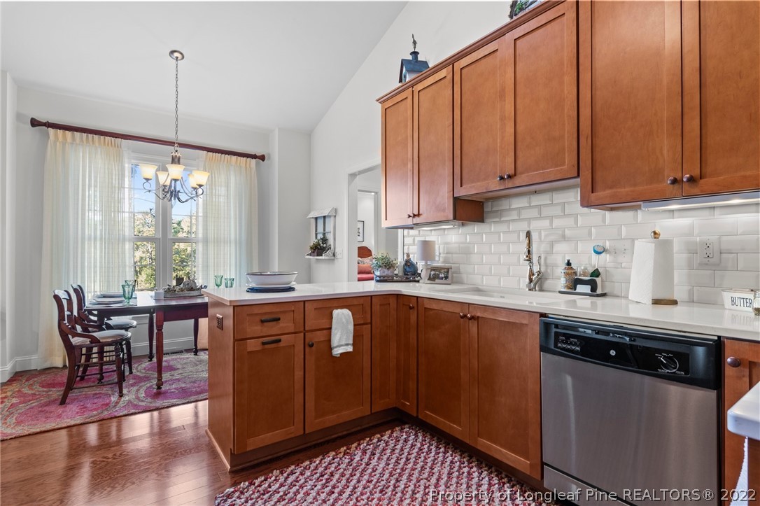 1570 Valley View Road Southern Pines, NC 28387 - Photo 19 of 44 a kitchen with a sink stove and cabinets
