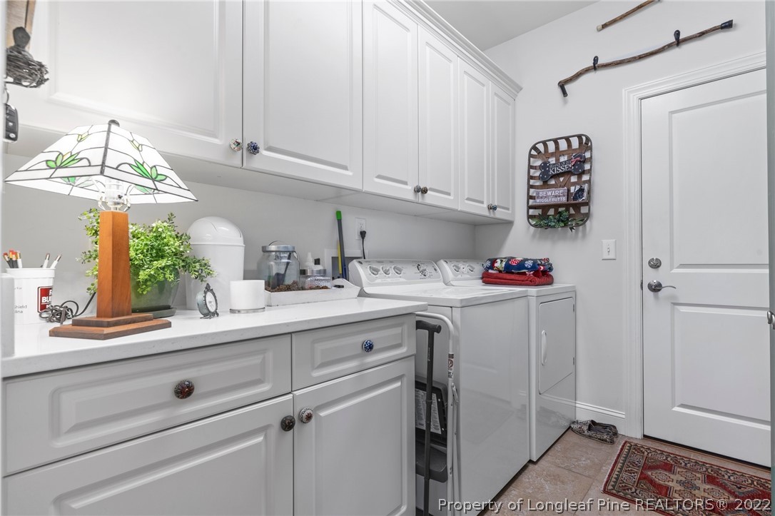 1570 Valley View Road Southern Pines, NC 28387 - Photo 28 of 44 a kitchen with a sink and cabinets