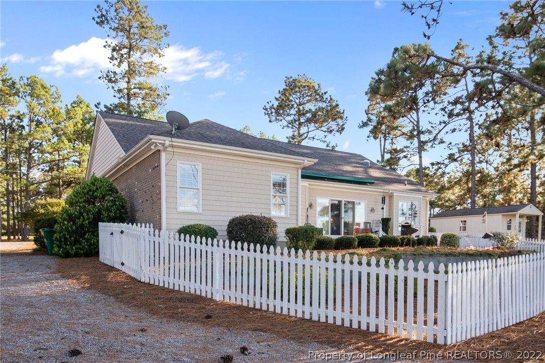 1570 Valley View Road Southern Pines, NC 28387 - Photo 33 of 44 a view of a house with wooden fence