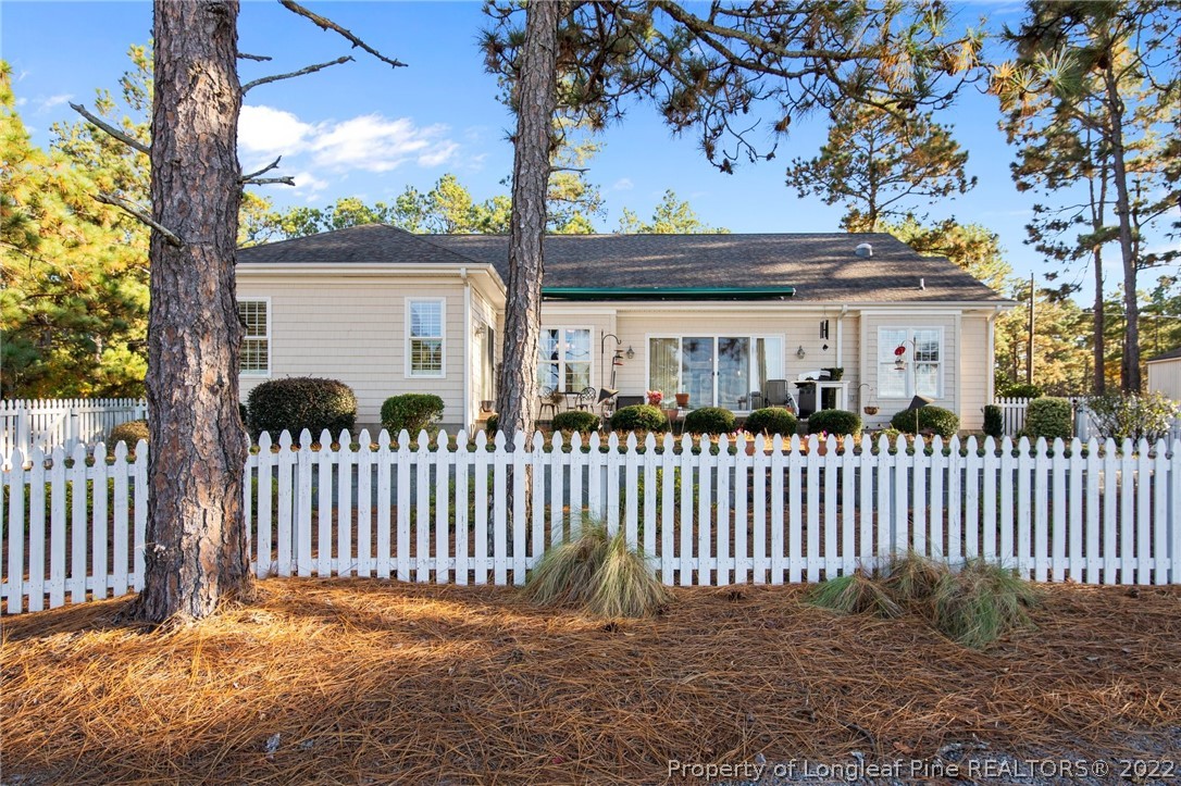 1570 Valley View Road Southern Pines, NC 28387 - Photo 34 of 44 a front view of a house with a garden