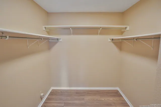 a view of a room with racks on the wall