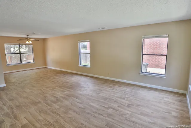 an empty room with windows