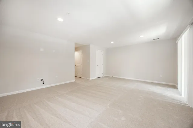 an empty room with an entryway