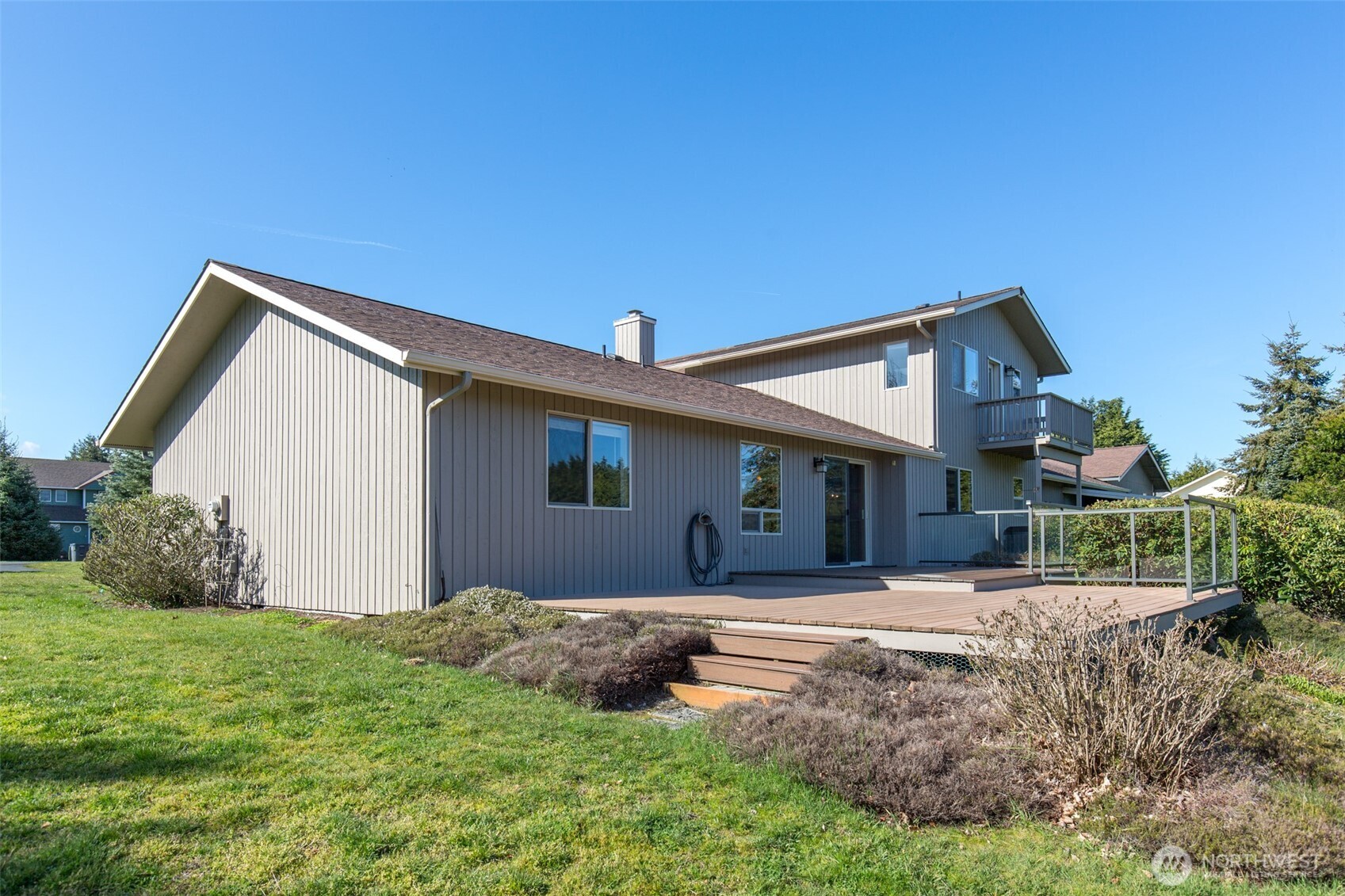 81 Bon Jon View Way Sequim, WA 98382 - Photo 5 of 38 a front view of a house with a yard