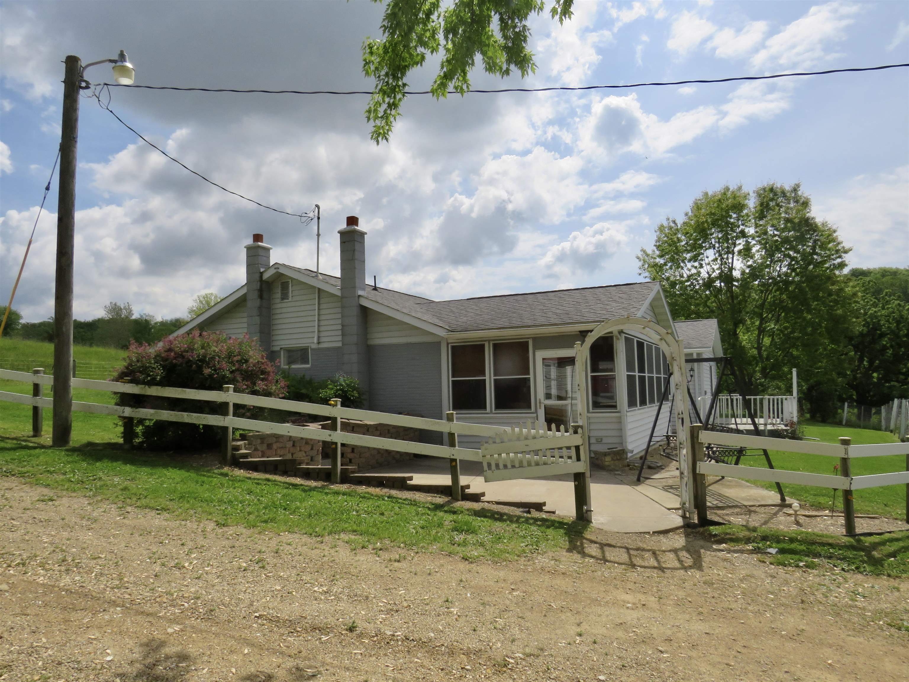 1139 Highway 20 Elizabeth, IL 61028 - Photo 12 of 88 a front view of a house with a yard