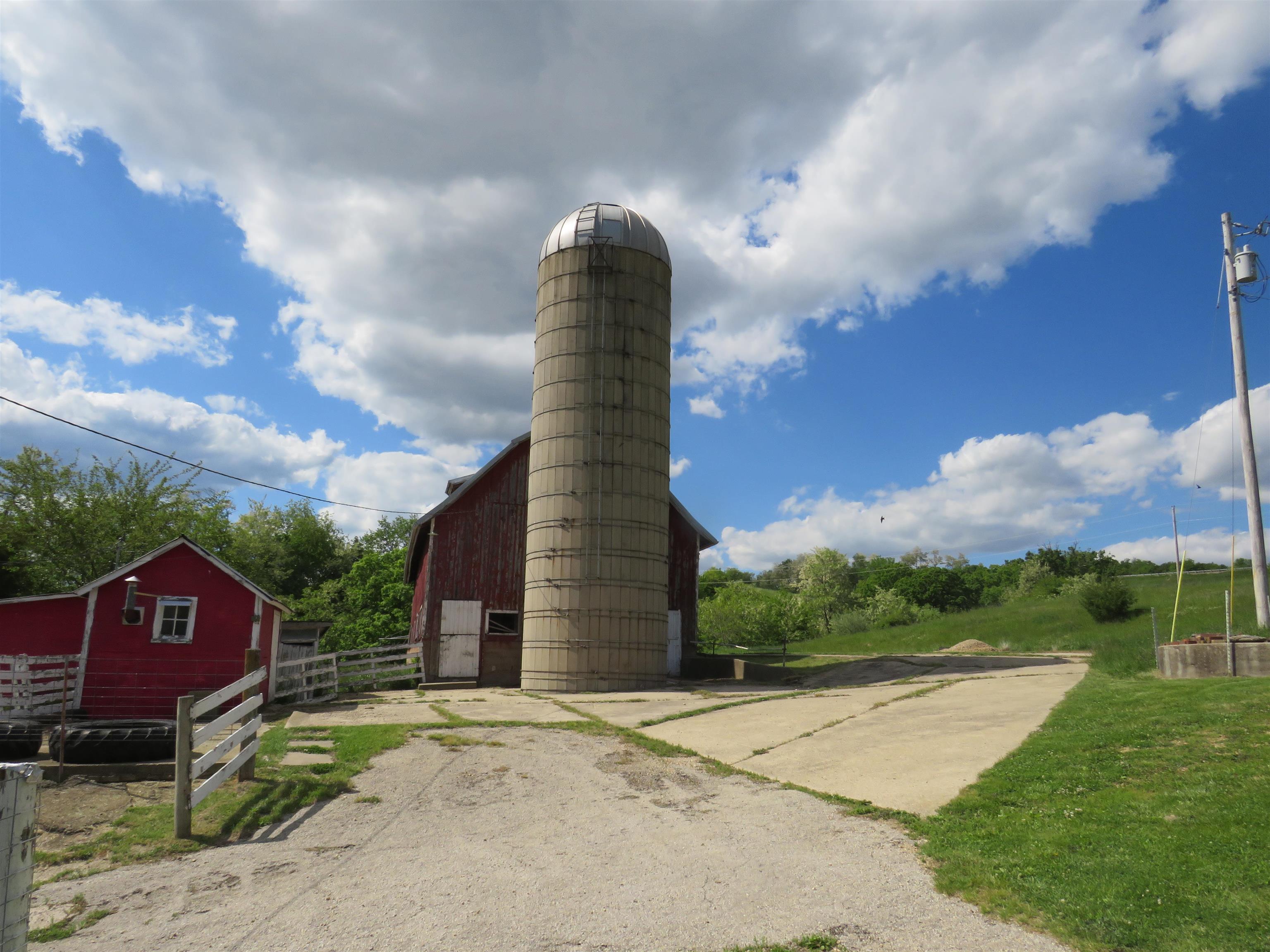 1139 Highway 20 Elizabeth, IL 61028 - Photo 57 of 88 a view of a brick house next to a yard