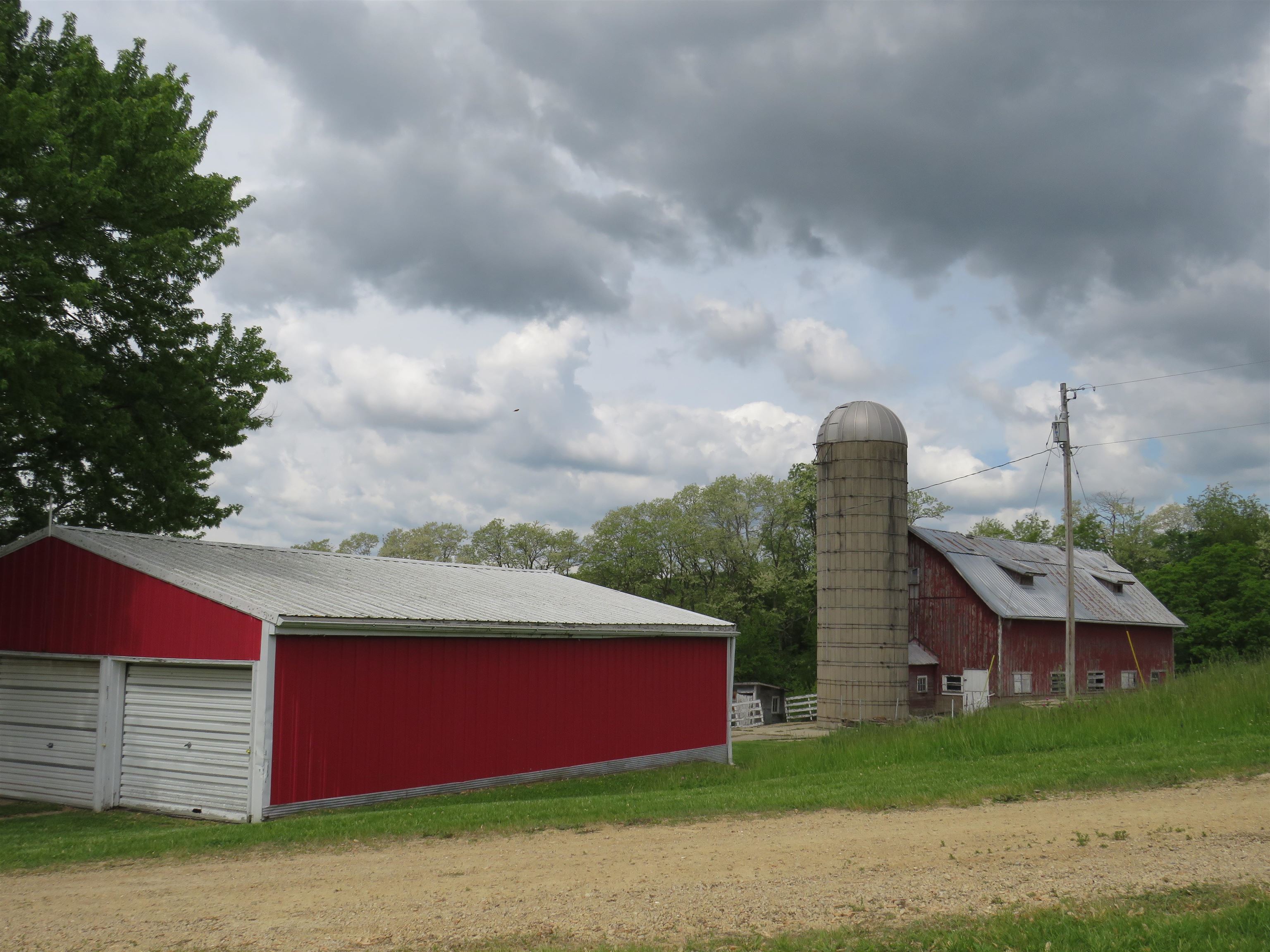 1139 Highway 20 Elizabeth, IL 61028 - Photo 63 of 88 a front view of a house with a garden