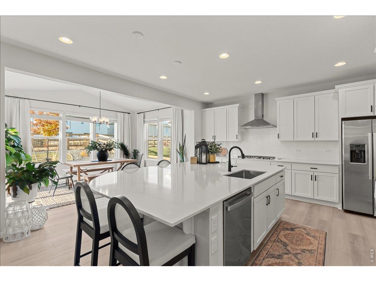 946 Rustling Street Windsor, CO 80550 - Photo 15 of 50 Massive quartz island