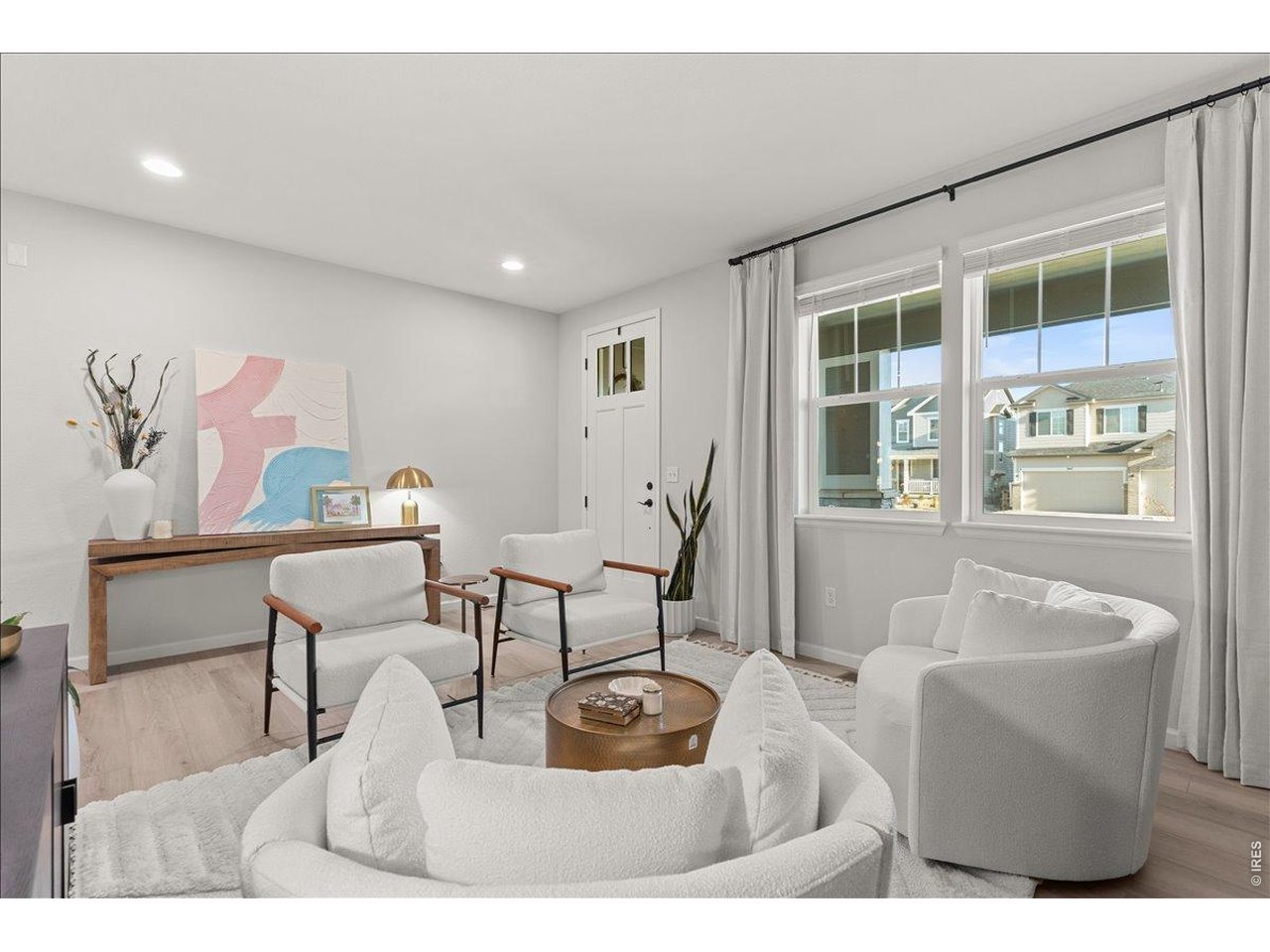 946 Rustling Street Windsor, CO 80550 - Photo 8 of 50 View of front door from living room/flex room