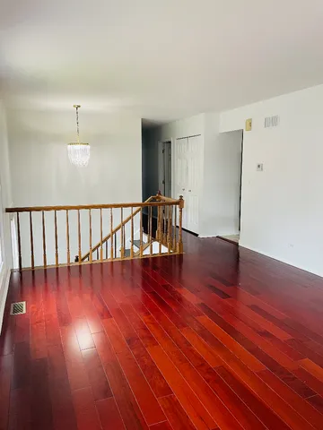 a view of dining room with wooden floor