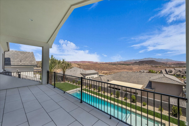 1620 Belayer Drive St. George, UT 84770 - Photo 36 of 51 Spacious covered balcony featuring large format tile flooring and black metal railings