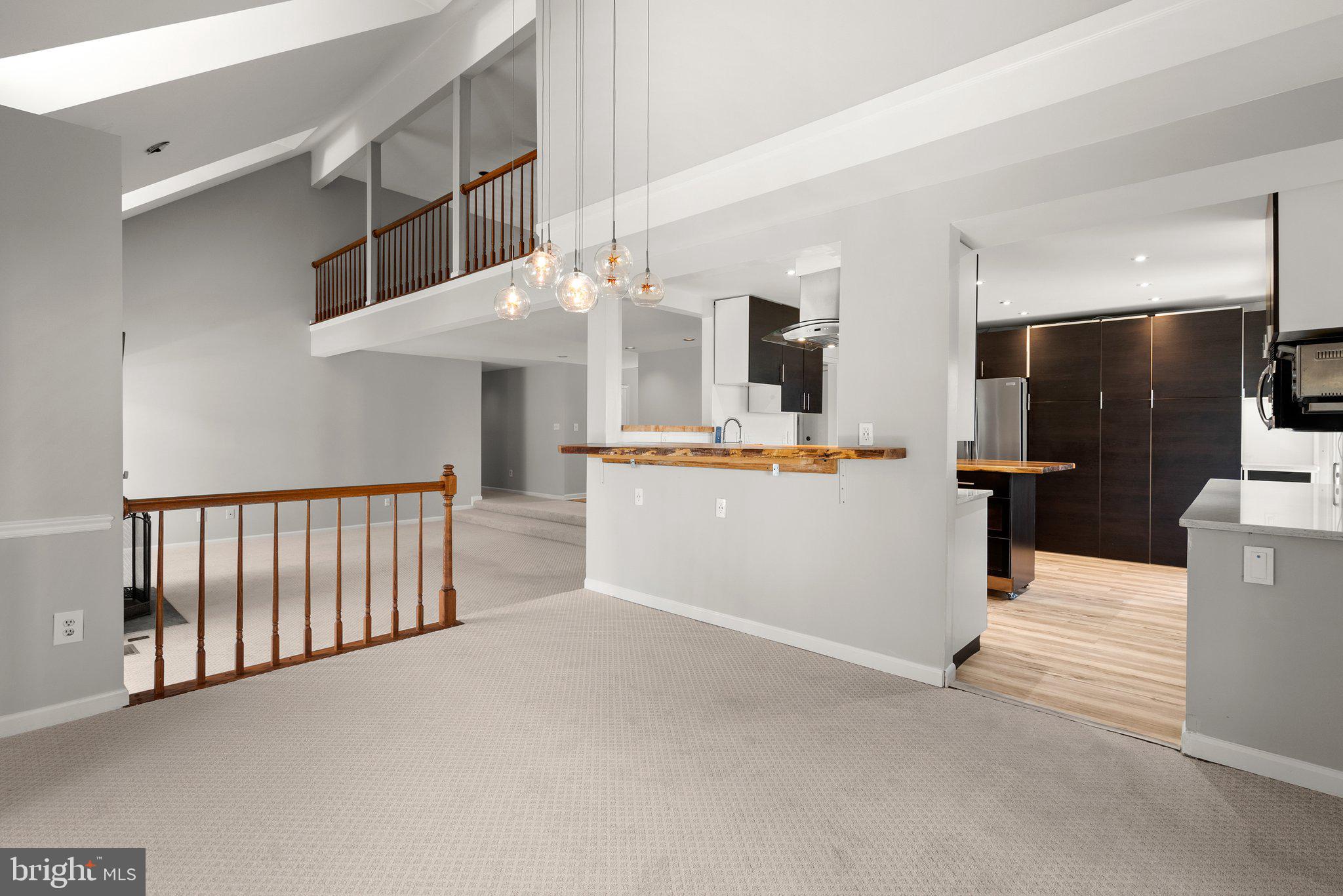 943 Willowleaf Way Potomac, MD 20854 - Photo 12 of 49 a view of a kitchen with furniture and a kitchen