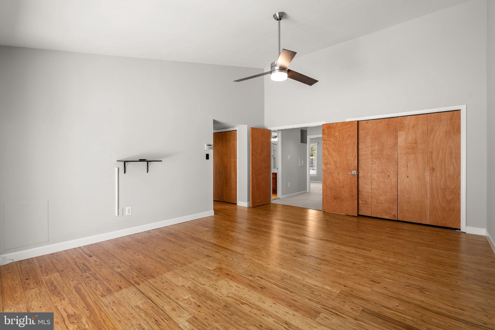 943 Willowleaf Way Potomac, MD 20854 - Photo 26 of 49 a view of an empty room with wooden floor