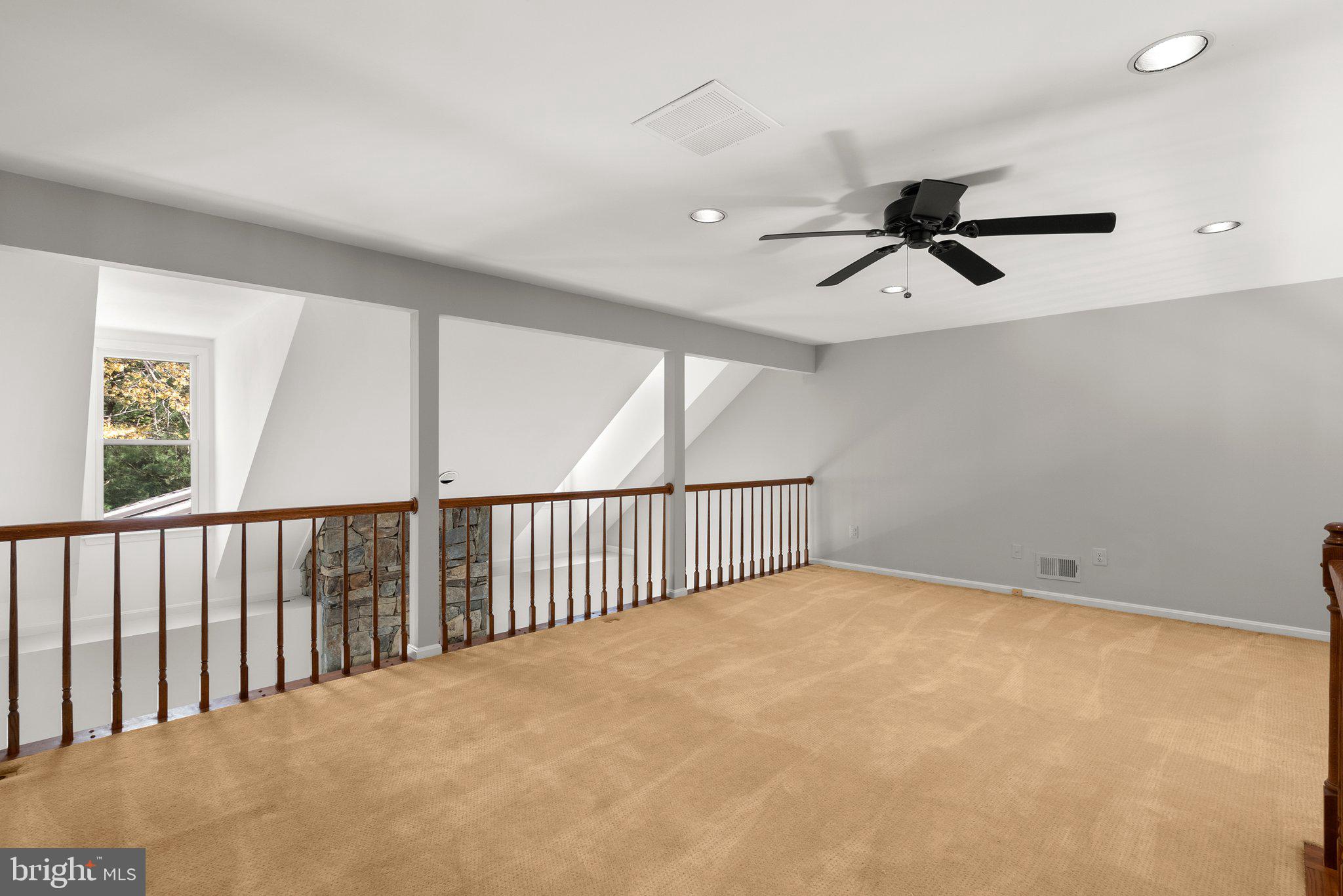 943 Willowleaf Way Potomac, MD 20854 - Photo 29 of 49 a view of a livingroom with a ceiling fan and window