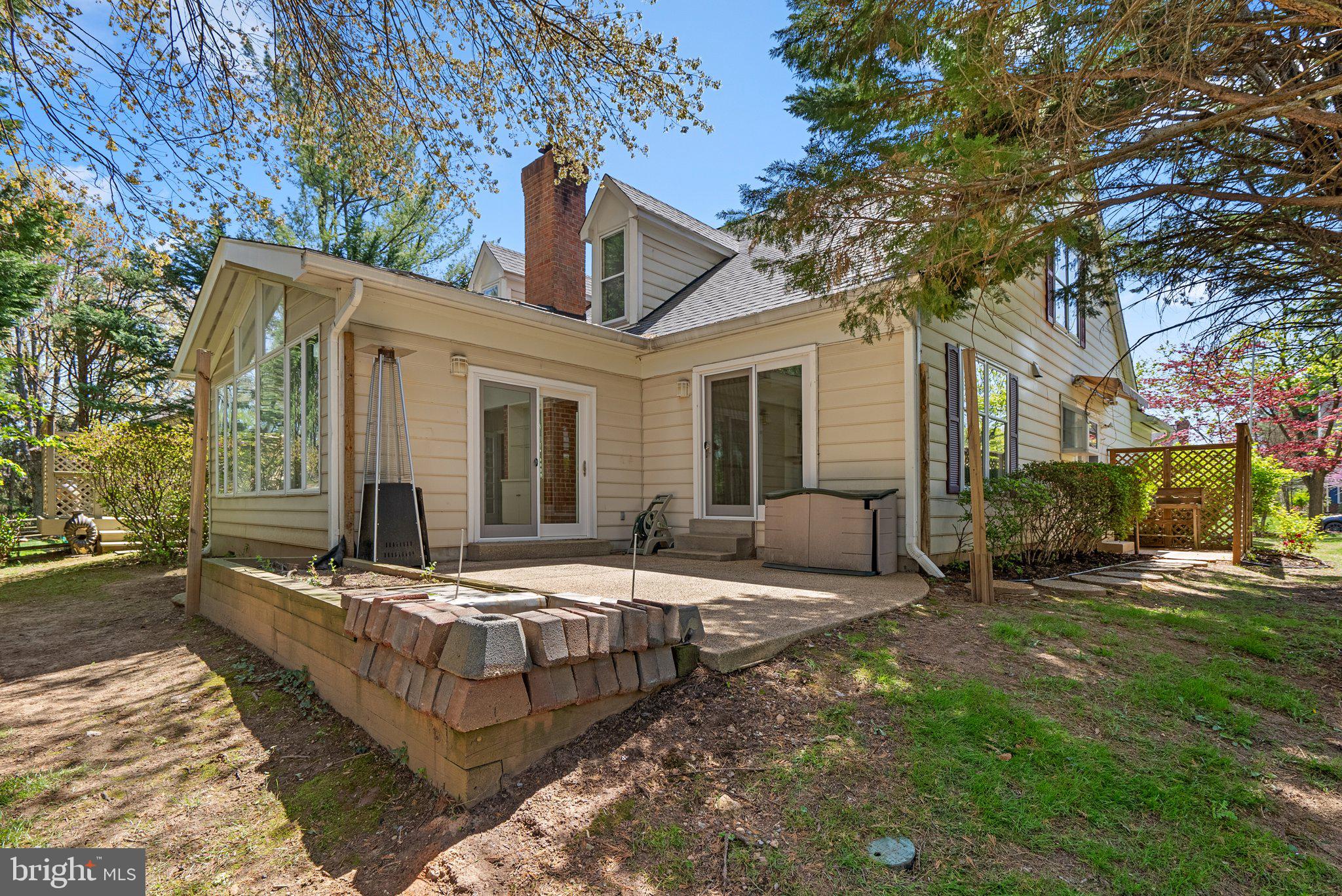 943 Willowleaf Way Potomac, MD 20854 - Photo 43 of 49 a view of a house with backyard and sitting area