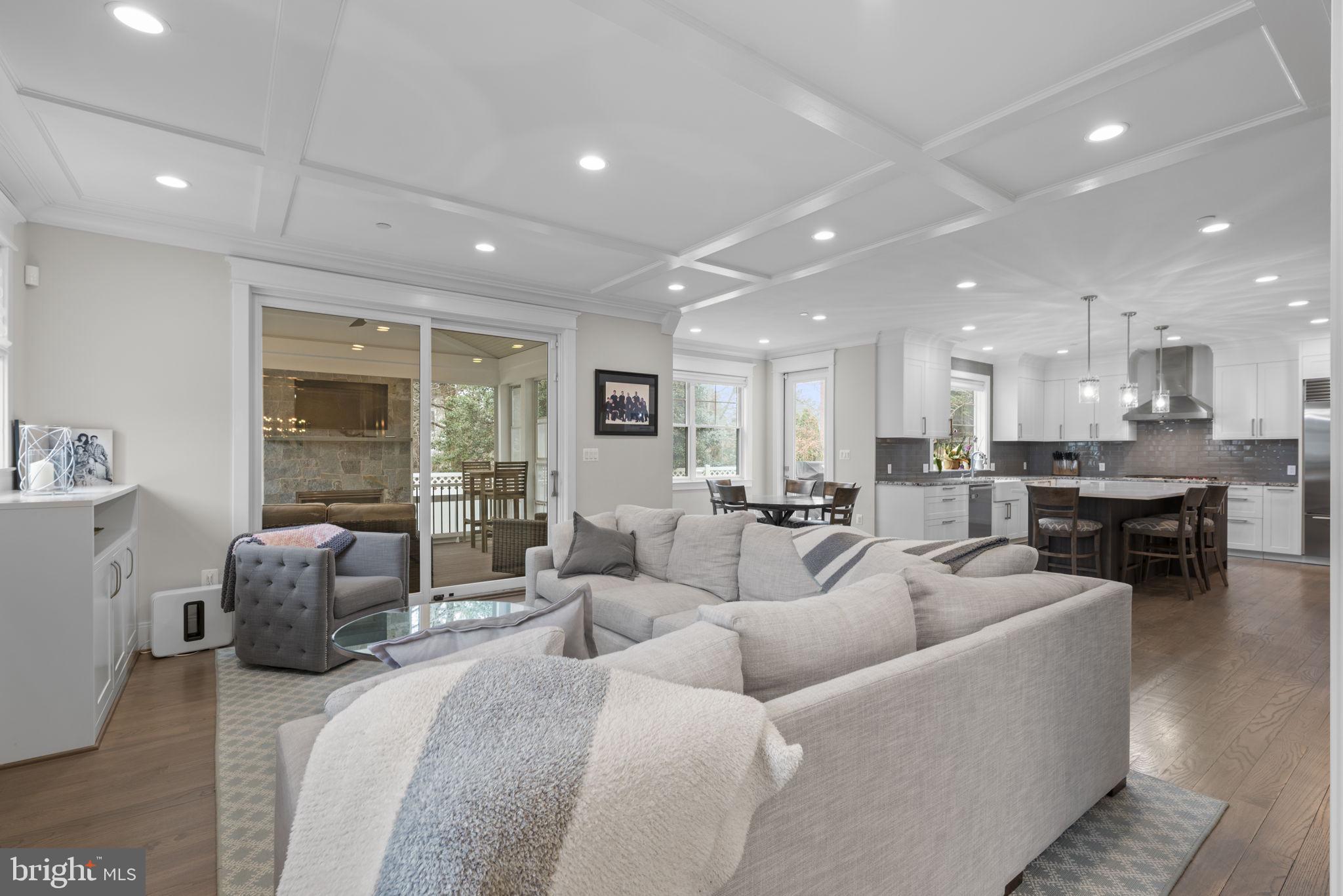 6304 Wilmett Road Bethesda, MD 20817 - Photo 15 of 47 Family Room open to kitchen and screened porch