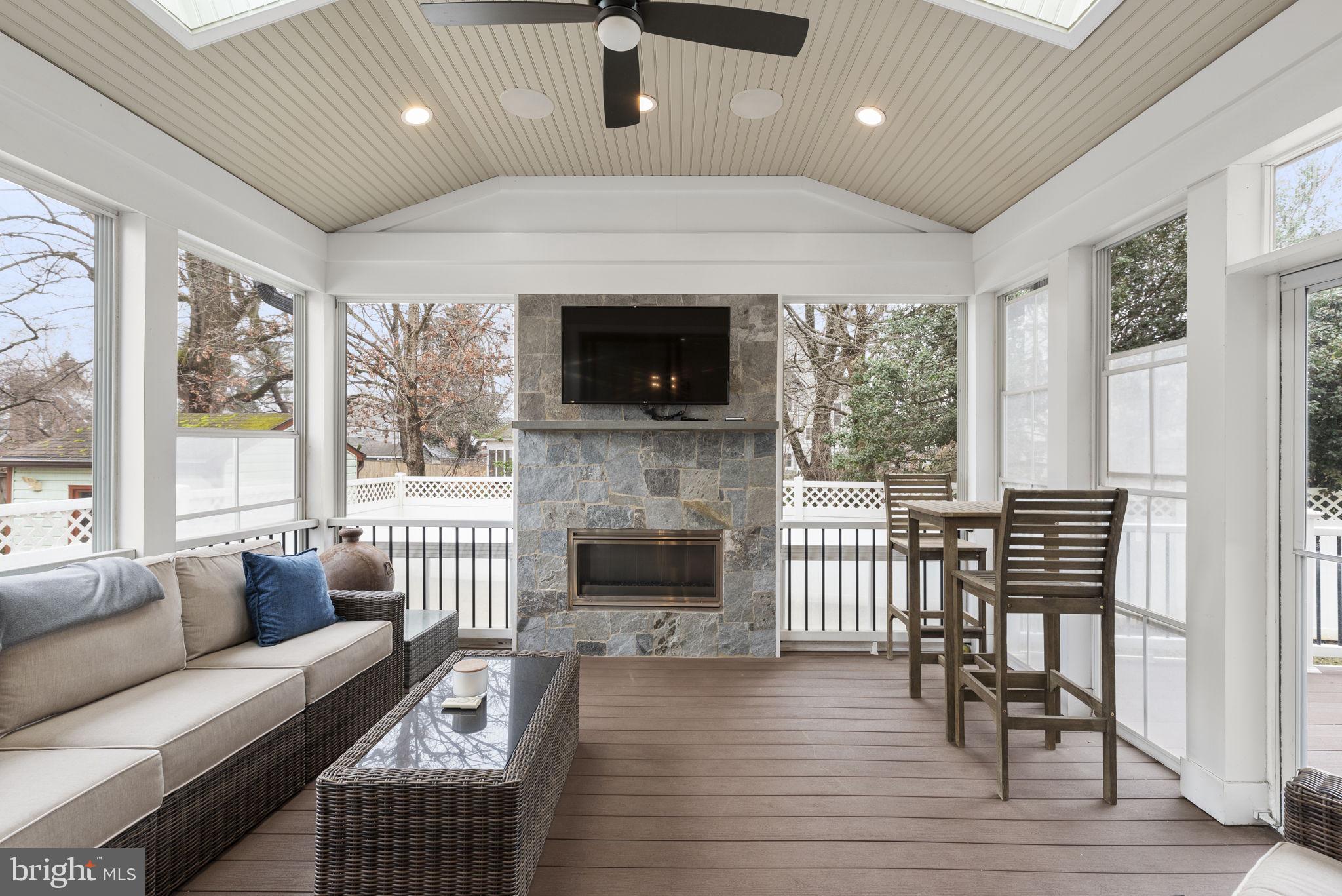 6304 Wilmett Road Bethesda, MD 20817 - Photo 22 of 47 Screened Porch with Fireplace & Fan