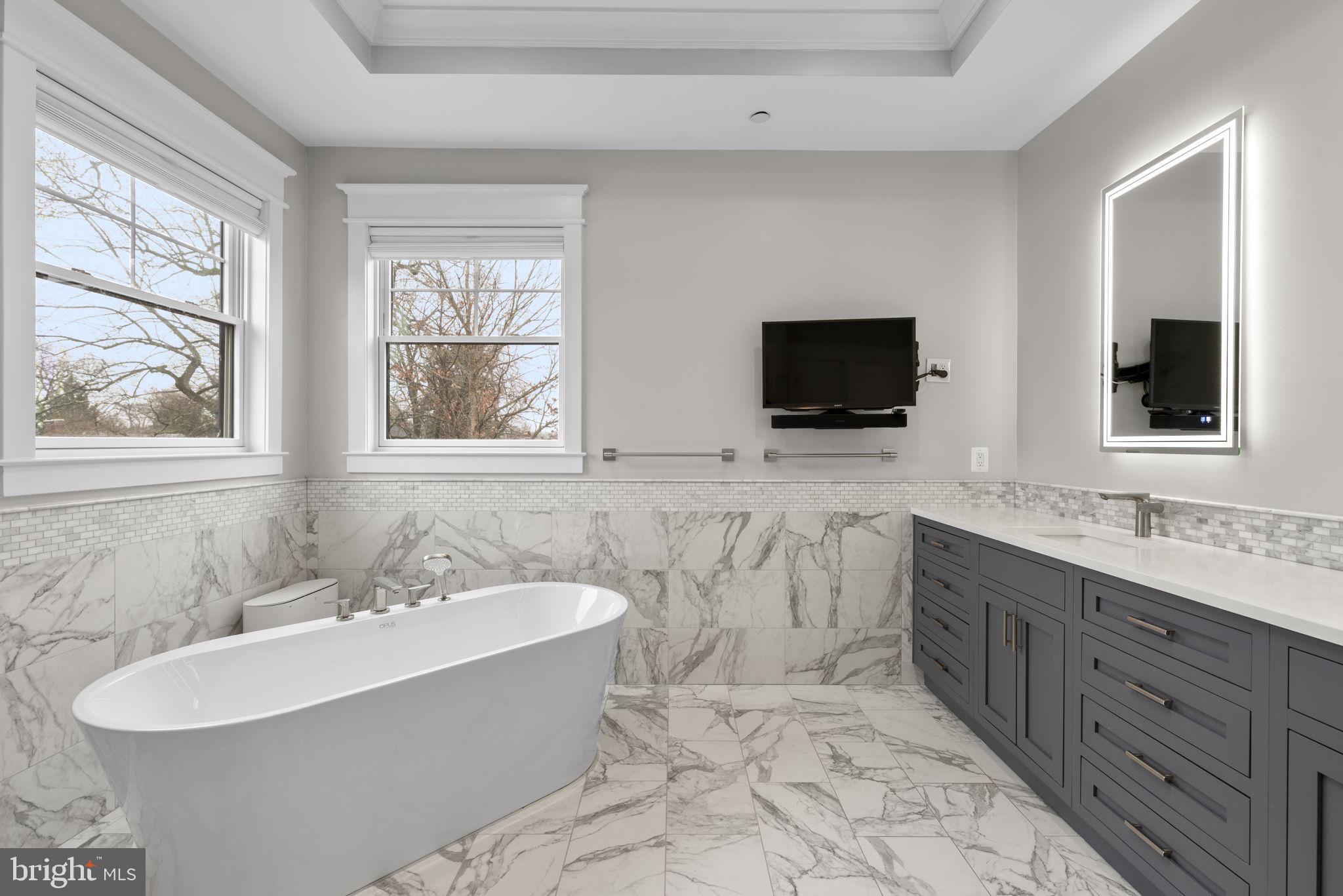 6304 Wilmett Road Bethesda, MD 20817 - Photo 28 of 47 Primary Bathroom with Marble Surround