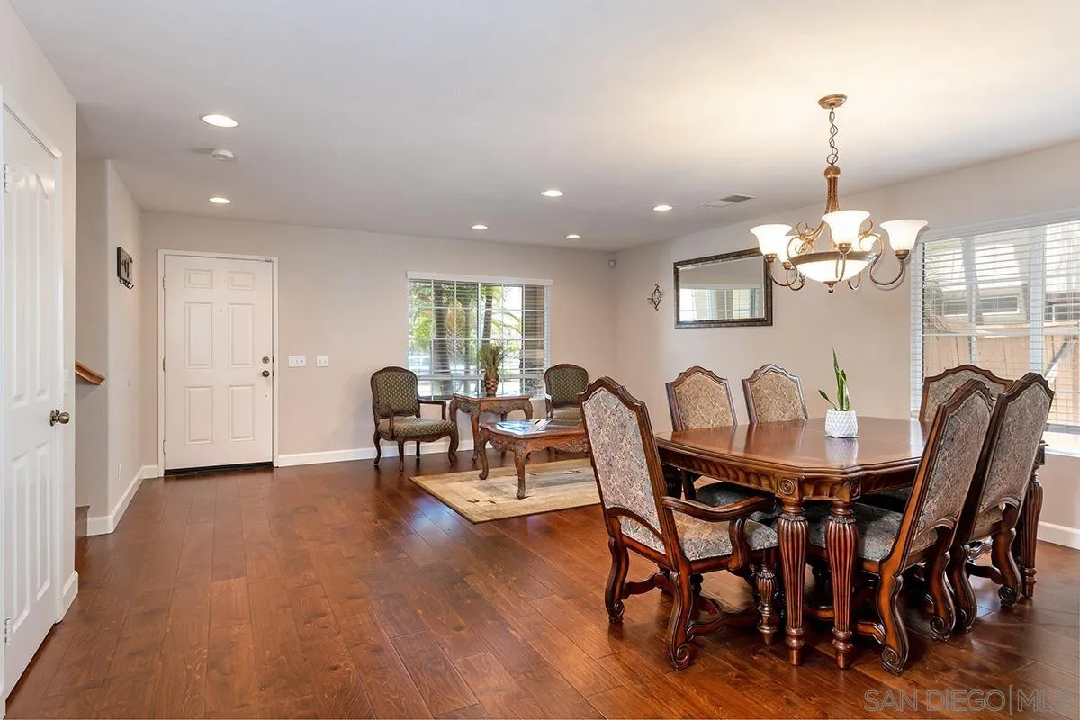 304 River Ranch Way Oceanside, CA 92057 - Photo 11 of 44 a view of a dining room with furniture window and wooden floor