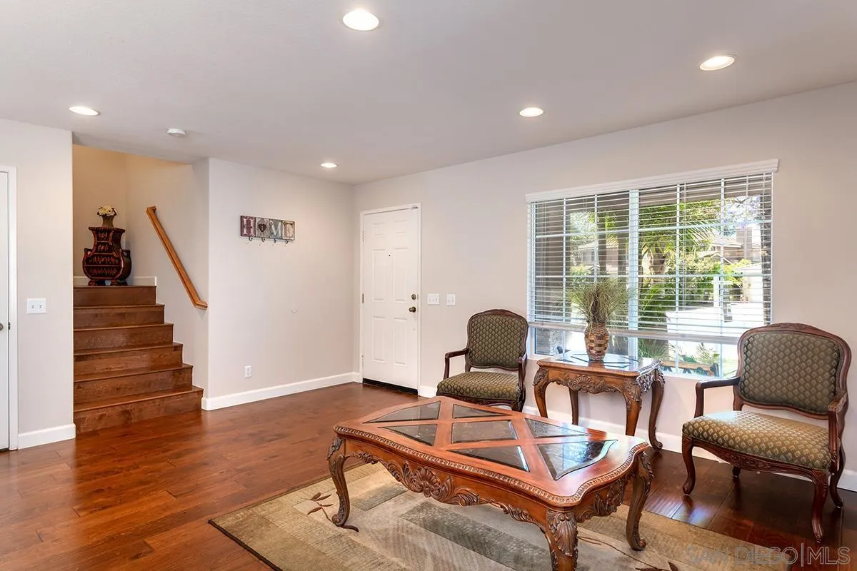 304 River Ranch Way Oceanside, CA 92057 - Photo 15 of 44 a living room with furniture and a large window