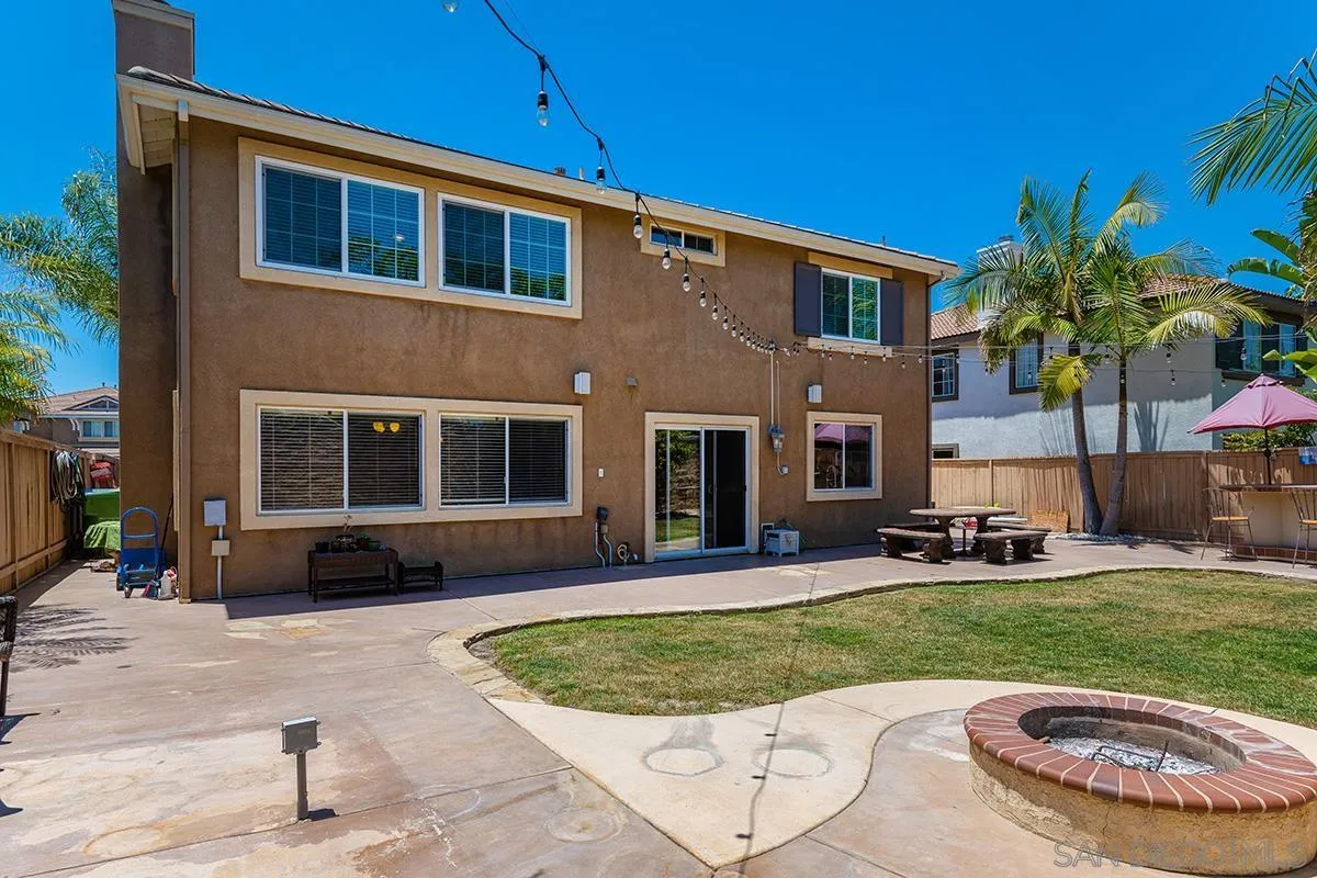 304 River Ranch Way Oceanside, CA 92057 - Photo 17 of 44 a view of a house with a swimming pool